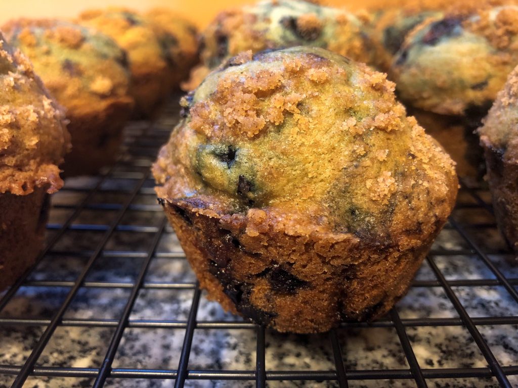 blueberry streusel muffins on wire rack