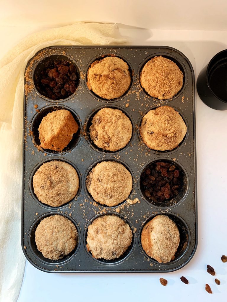 cinnamon raisin muffins with streusel in muffin pan top view