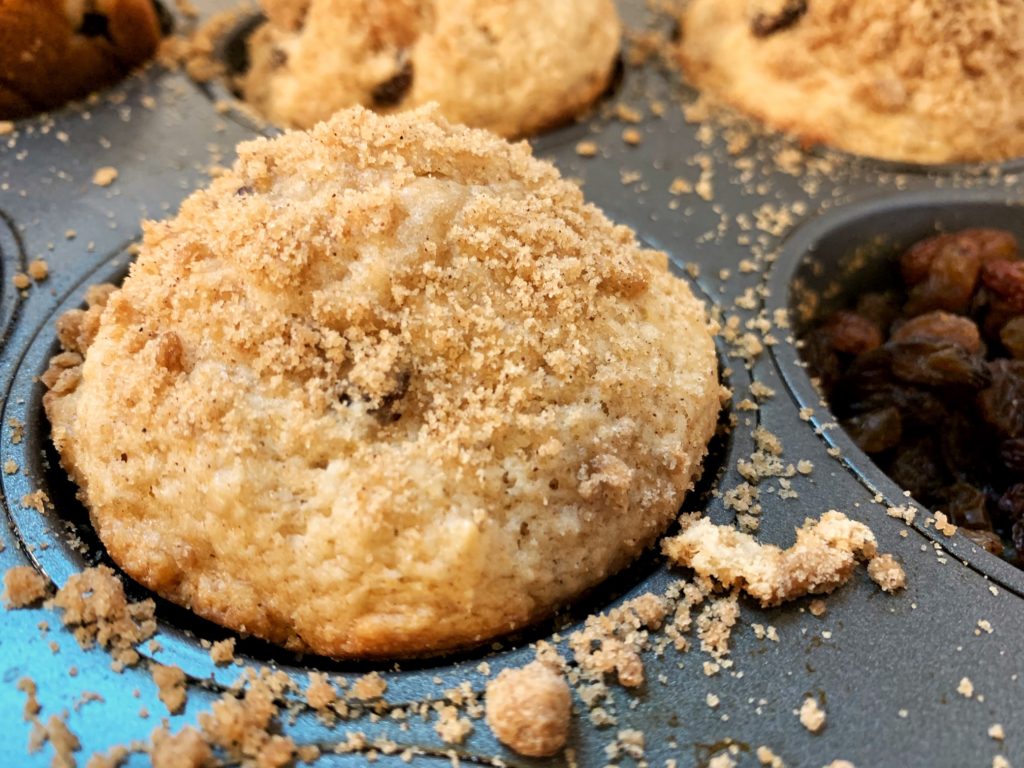 cinnamon raisin muffins with streusel in muffin pan