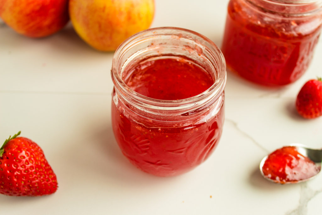 open jar of apple strawberry jam