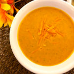 broccoli cheddar soup in bowl overhead shot