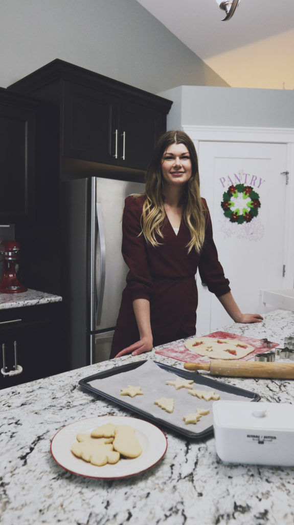 Taylor Harrison in home kitchen making sugar cookies