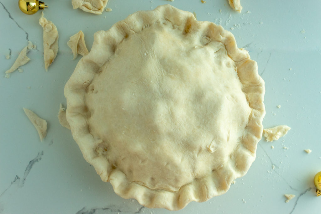 fluted double pie crust overhead shot