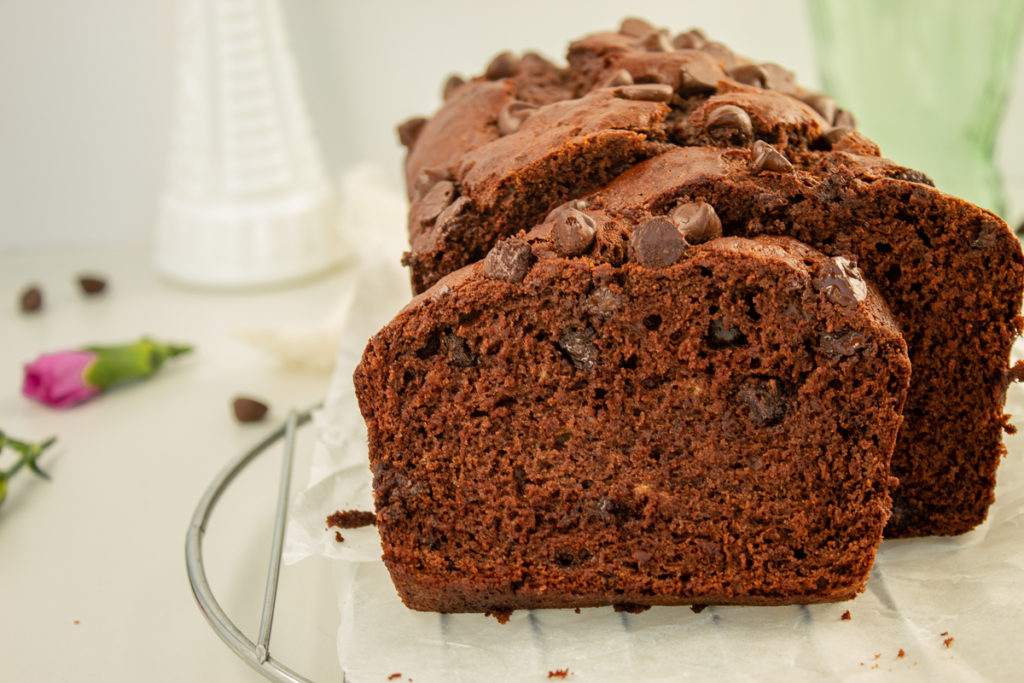 Double Chocolate Banana Bread on parchment paper on wire rack.