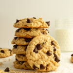 Oatmeal Chocolate Chip cookies stacked with a cookie in front straight shot.