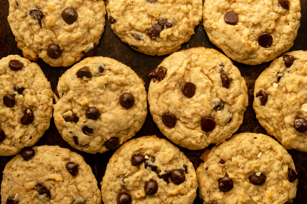 Oatmeal Chocolate Chip cookies overhead shot on cookie sheet.