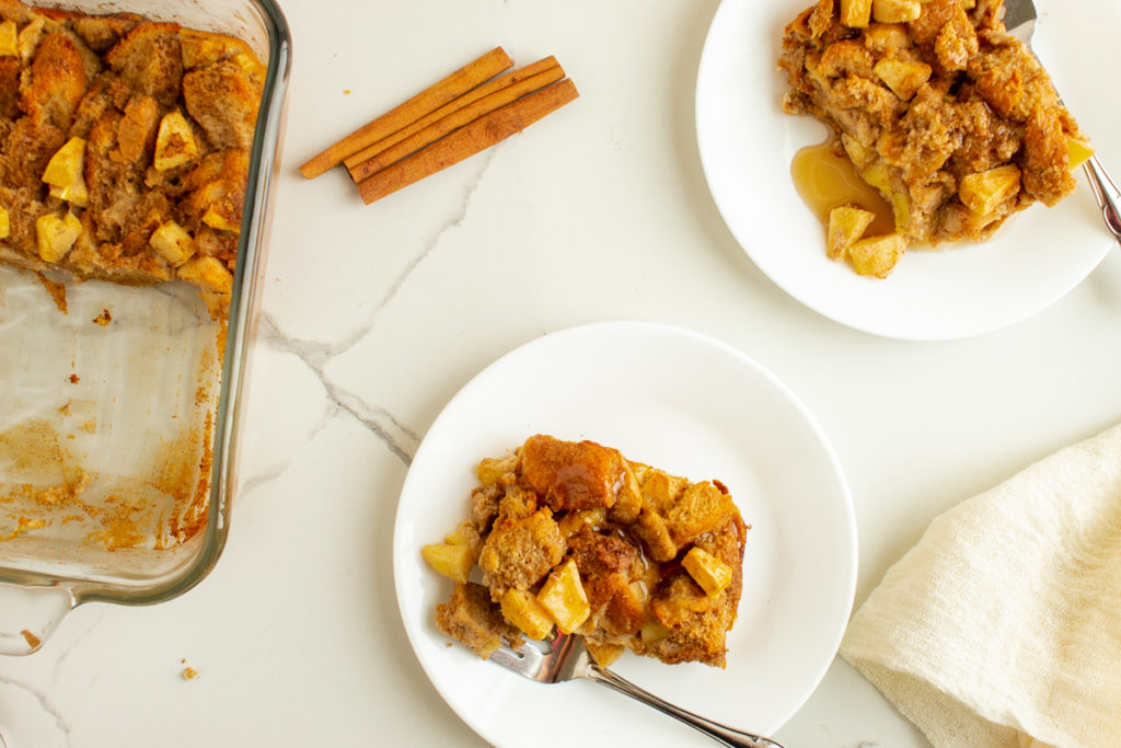 Apple Cinnamon French toast casserole on plates overhead shot