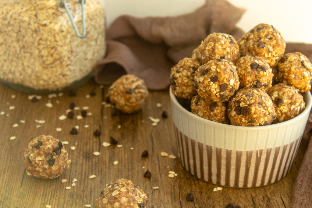 Healthy no bake energy balls in bowl.