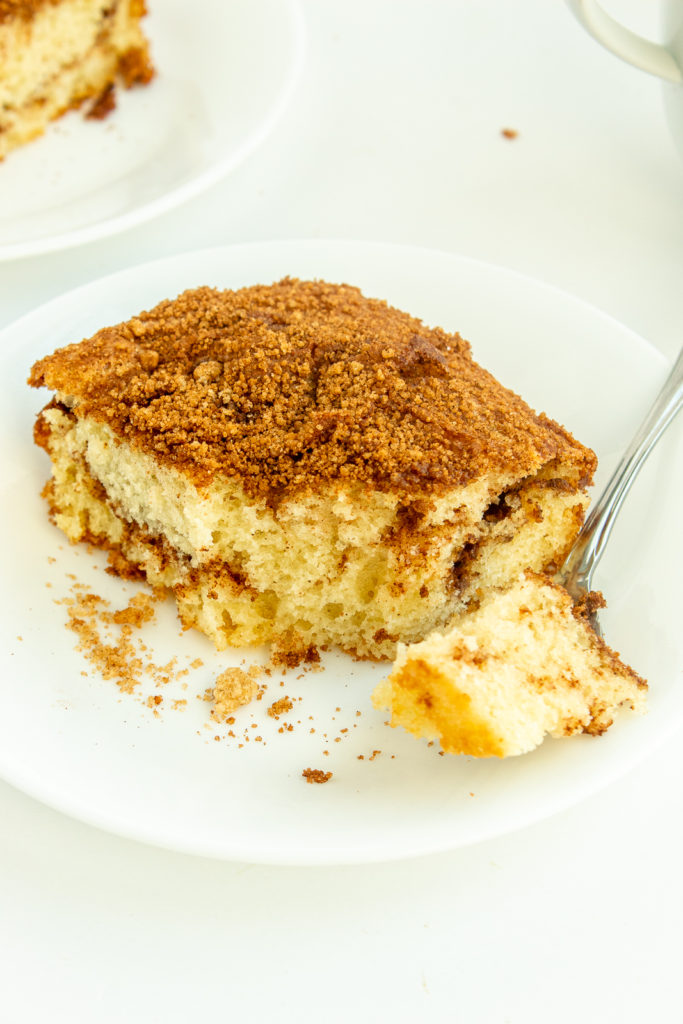 Moist Coffee Cake on plate with fork angled shot.