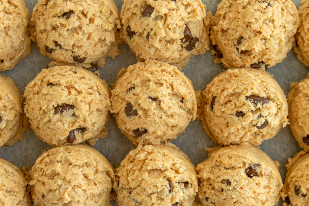 Overhead shot of Peanut butter oatmeal chocolate chip cookie dough mounds.