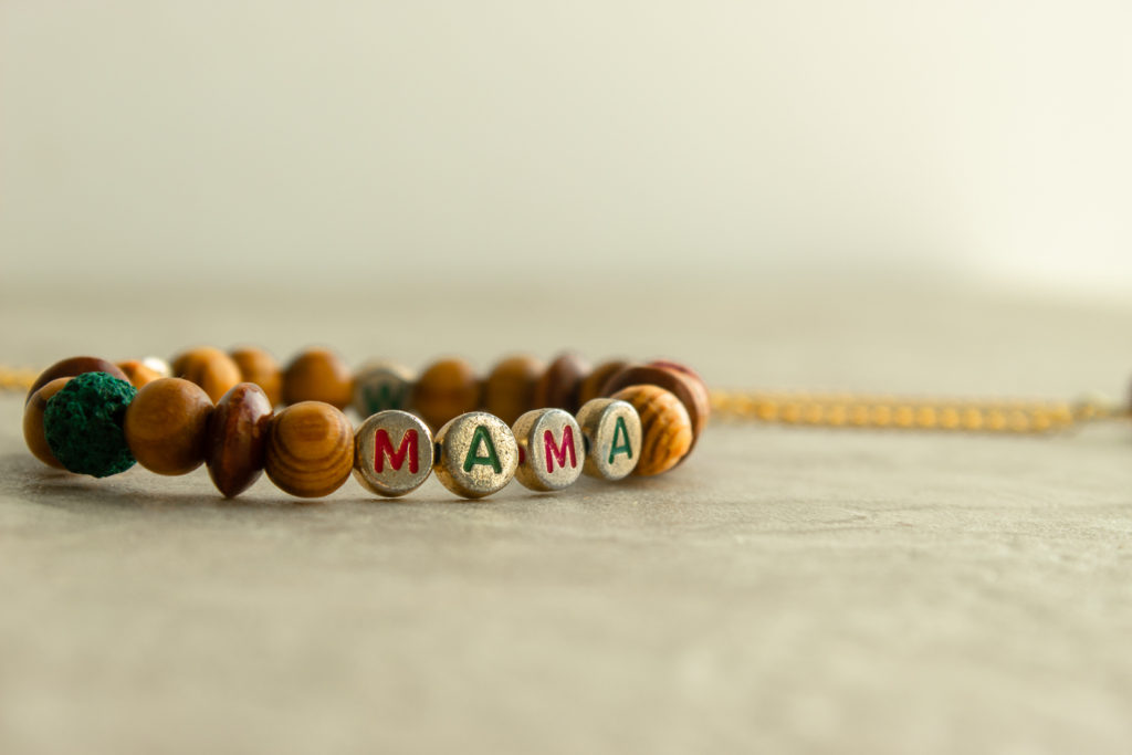 Homamde bracelet with beads that say "MAMA"