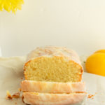 Gluten-Free Lemon Loaf recipe sliced on cutting board straight on shot.