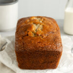 Easy Moist Banana bread loaf on wire rack angled shot.