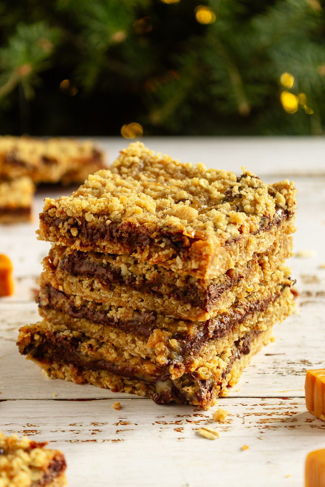 Carmelitas stacked shot with Christmas tree and lights in background.