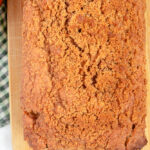 Apple Cinnamon streusel bread overhead shot on wooden cutting board.