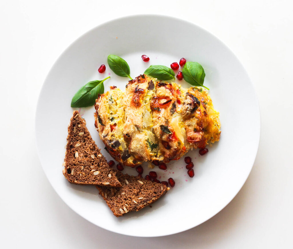 Romantic dinner recipe for two: frittata cavolo on plate overhead shot.